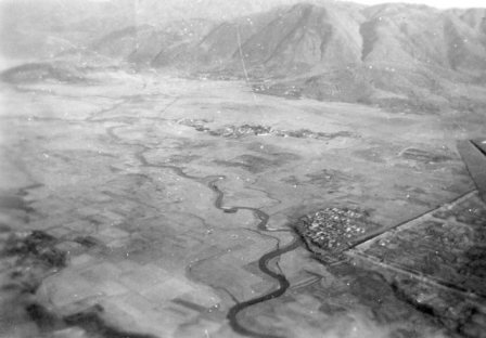  Aerial view of Tengchung showing mountains in the background 