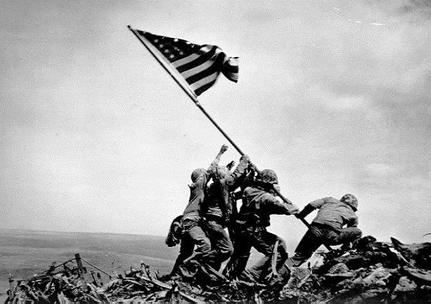  American flag being raised on Mt. Suribachi 